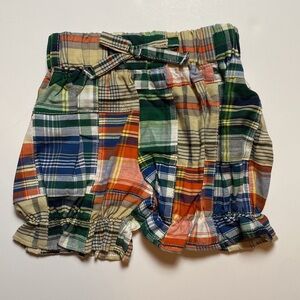 Blue, green, and orange plaid shorts